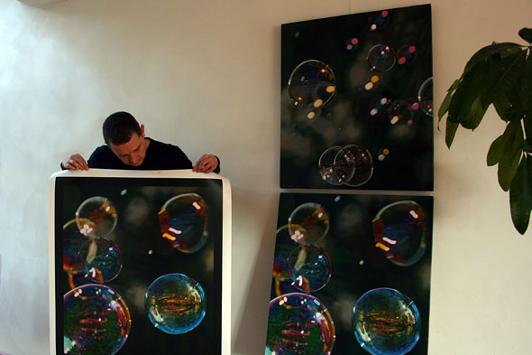 Artist Peter Strobos showing original artwork and Giclee print.